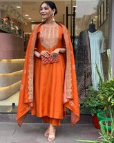 Vibrant Orange Suit Set with Traditional Embroidery