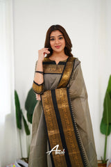 Graceful Ethnic Wear: Grey Churidar Suit with Rich Gold Detailing