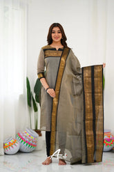 Graceful Ethnic Wear: Grey Churidar Suit with Rich Gold Detailing