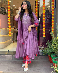 "Rust Mirror-Work Anarkali Set with Tassel Detailing – Festive Elegance"