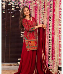 Stunning Red Ethnic Wear with Intricate Detailing