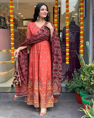 "Elegant Rust Anarkali Set with Maroon Dupatta & Potli Bag – Festive & Ethnic Wear"