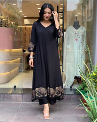"Black Kurta Set with Embroidered Elephant Motifs – Chic Ethnic Statement"
