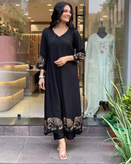 "Black Kurta Set with Embroidered Elephant Motifs – Chic Ethnic Statement"