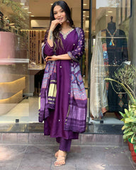 "Royal Purple Silk Suit with Embroidered Neckline & Printed Dupatta – Elegant Festive Wear"
