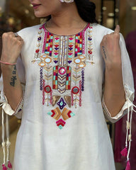 Traditional White Chikankari Suit with Colorful Detailing