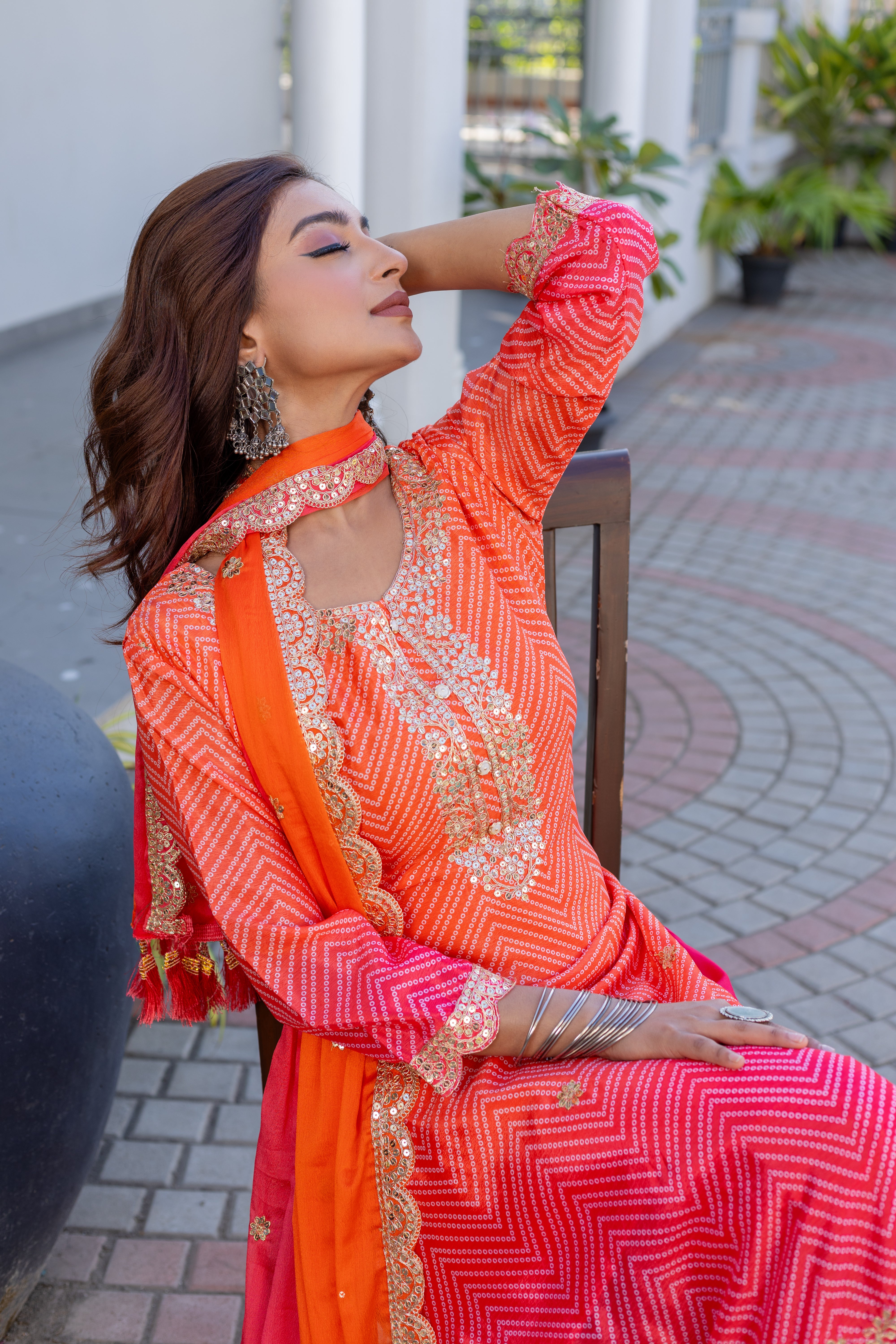 "Radiant Orange & Pink Embroidered Suit – Traditional Festive Ensemble"