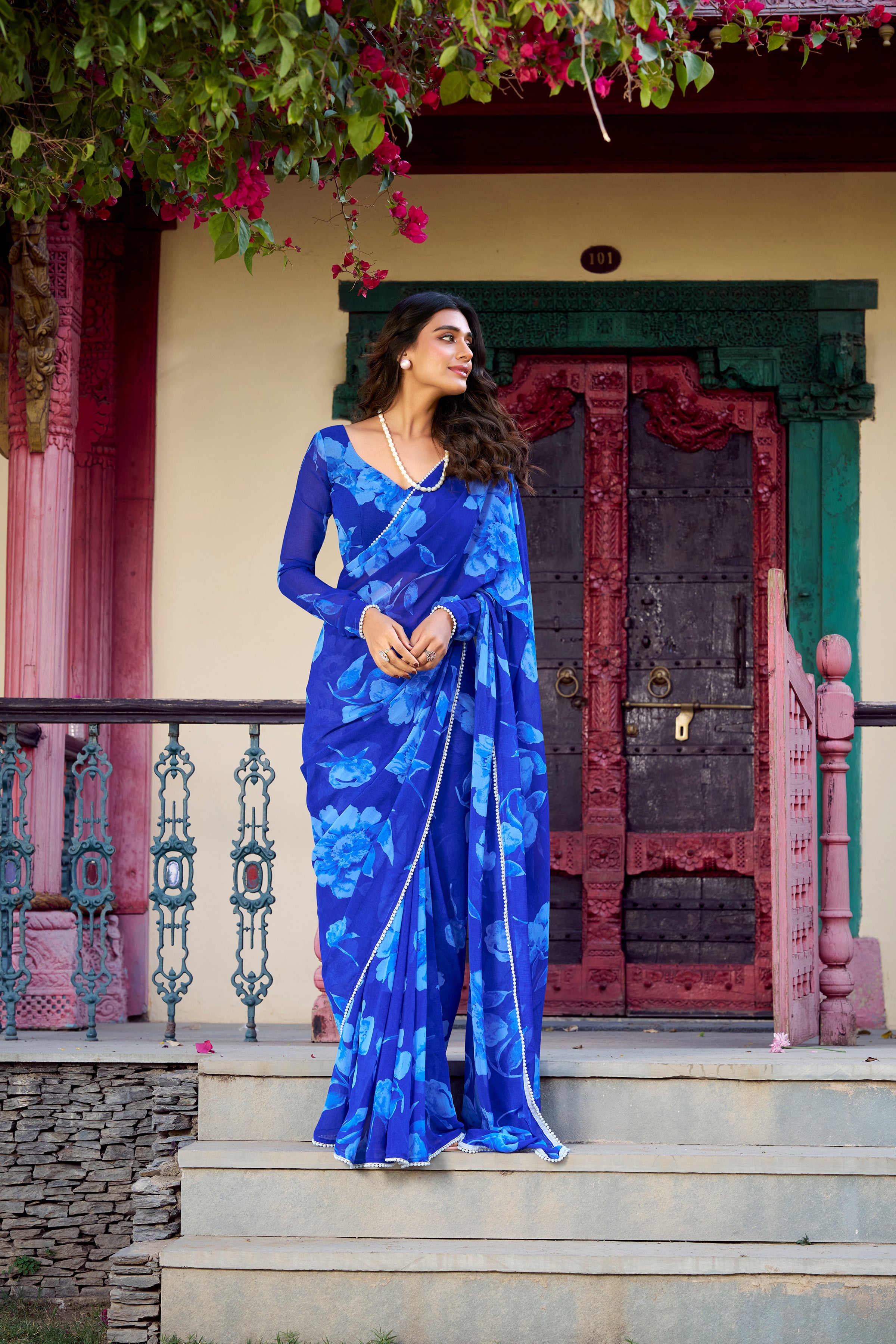 Chiffon Classic Designer Saree in Blue Enhanced with Floral Print