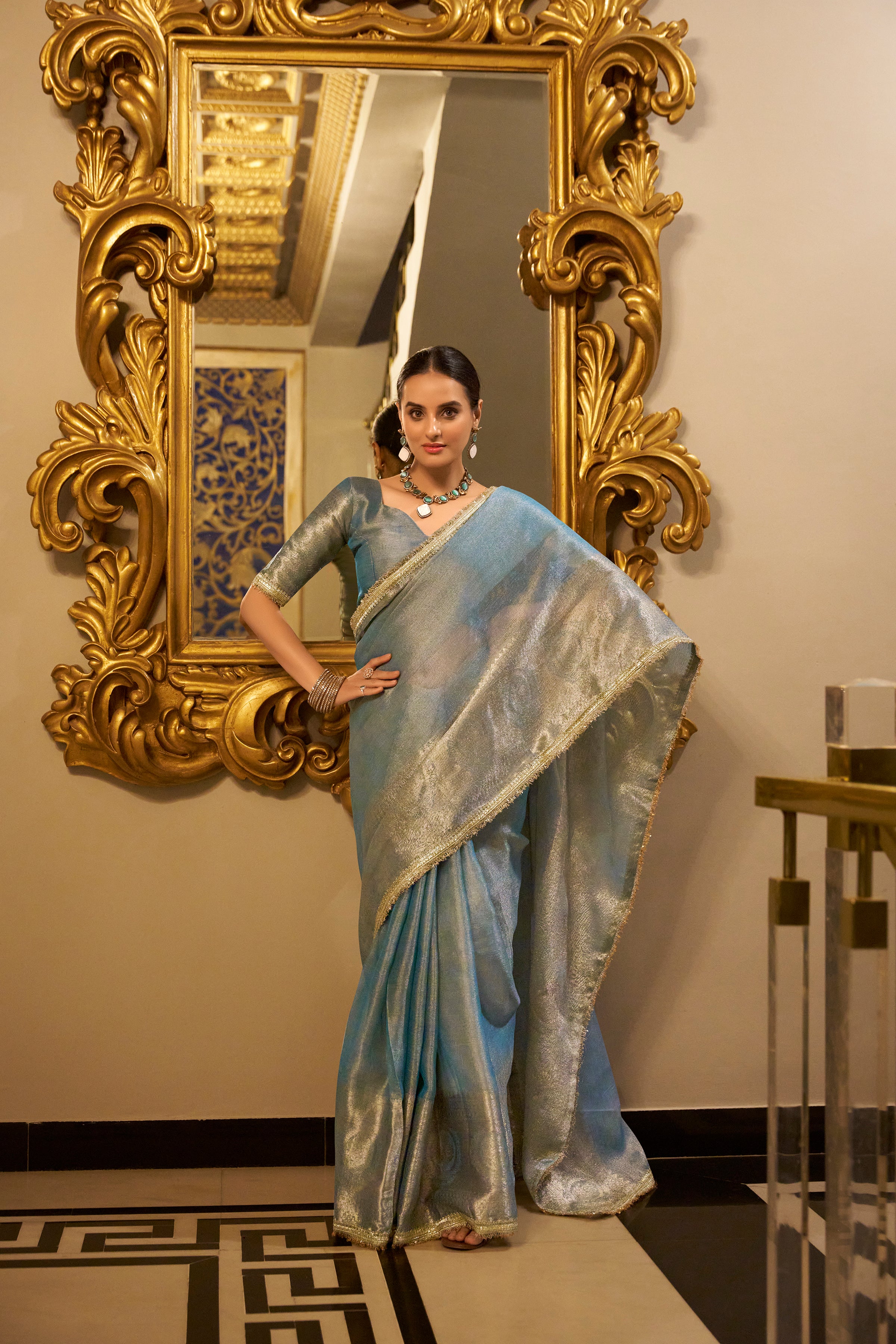 Sky Blue Color Zari Weaving Work With Sequins Border Tissue Shimmer Saree