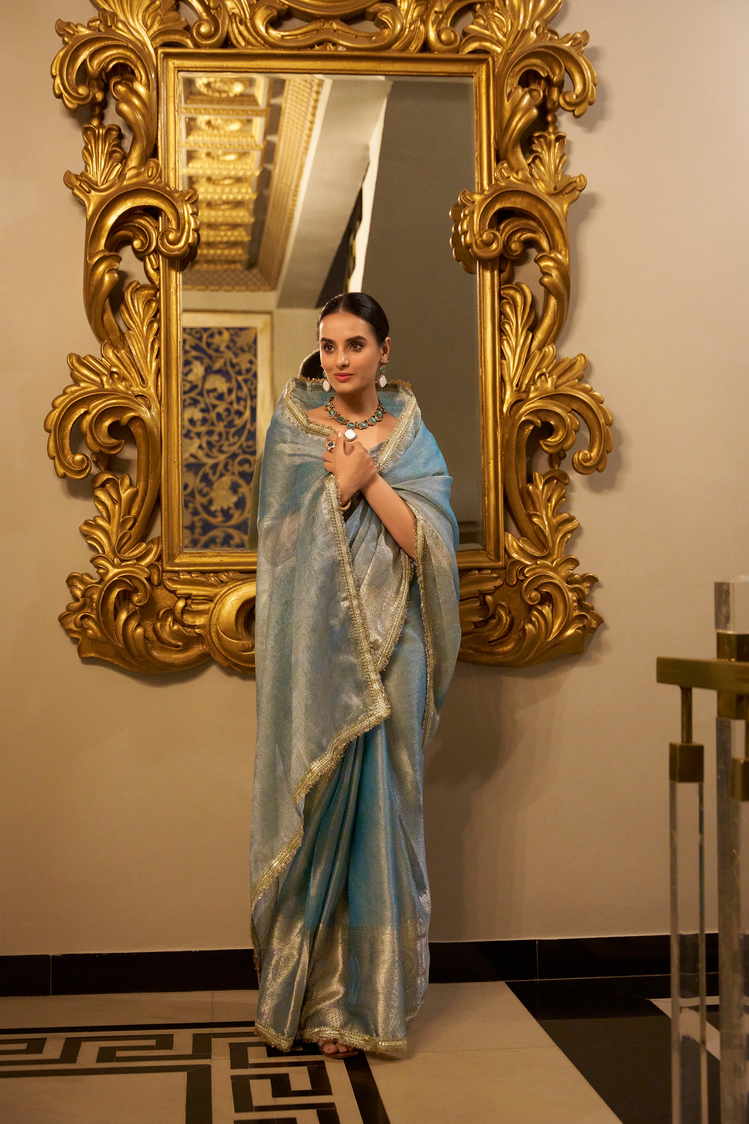 Sky Blue Color Zari Weaving Work With Sequins Border Tissue Shimmer Saree