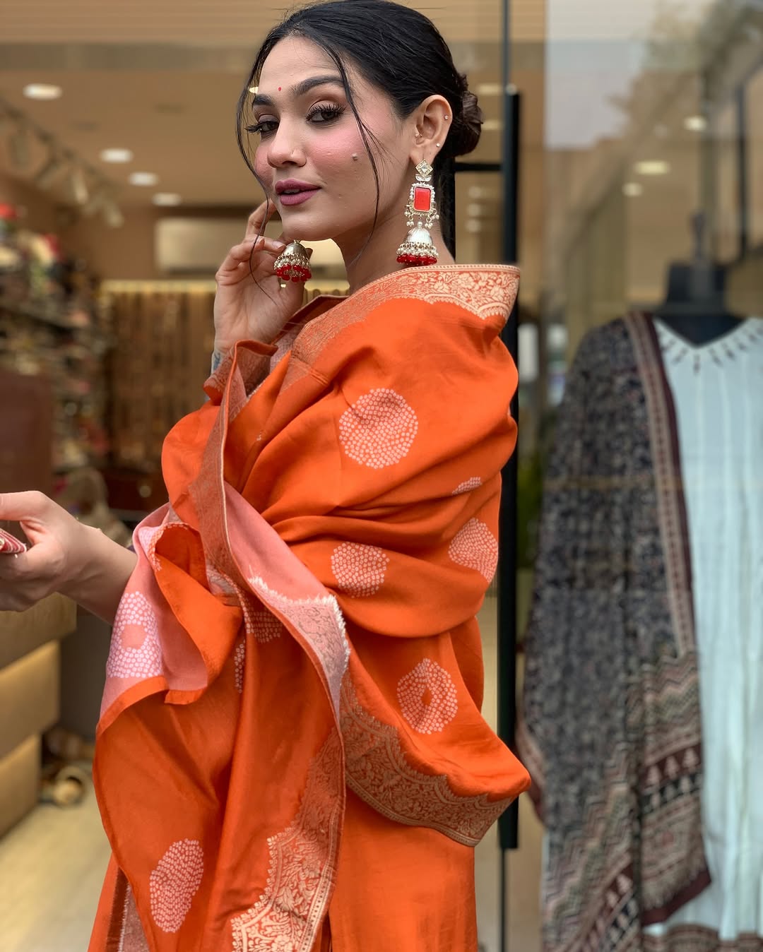 Vibrant Orange Suit Set with Traditional Embroidery
