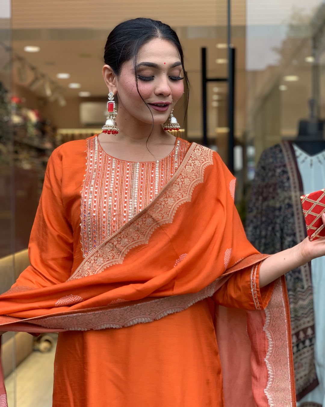 Vibrant Orange Suit Set with Traditional Embroidery