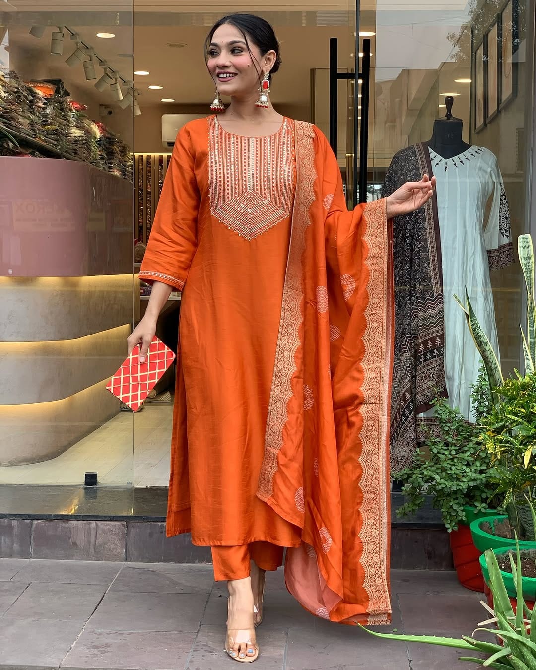 Vibrant Orange Suit Set with Traditional Embroidery