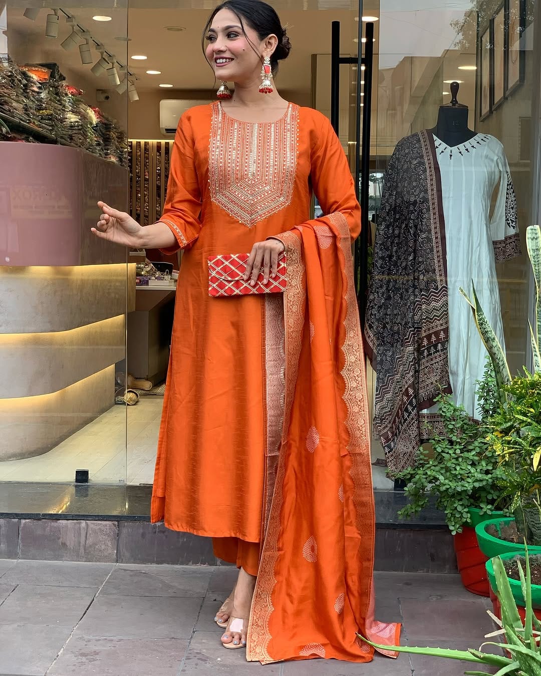 Vibrant Orange Suit Set with Traditional Embroidery