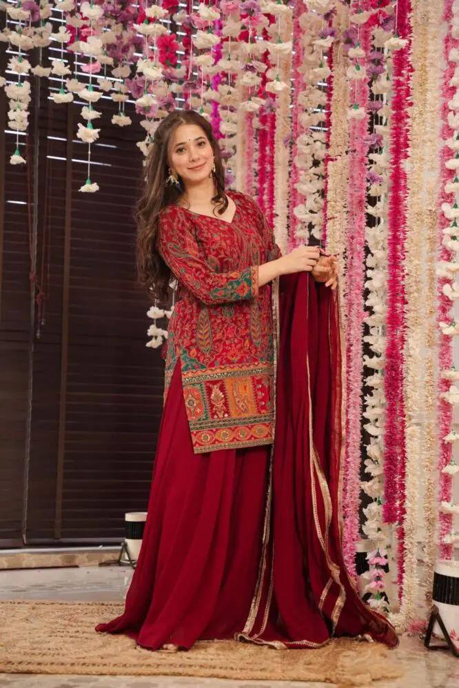 Stunning Red Ethnic Wear with Intricate Detailing
