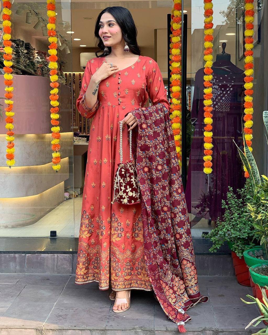 "Elegant Rust Anarkali Set with Maroon Dupatta & Potli Bag – Festive & Ethnic Wear"