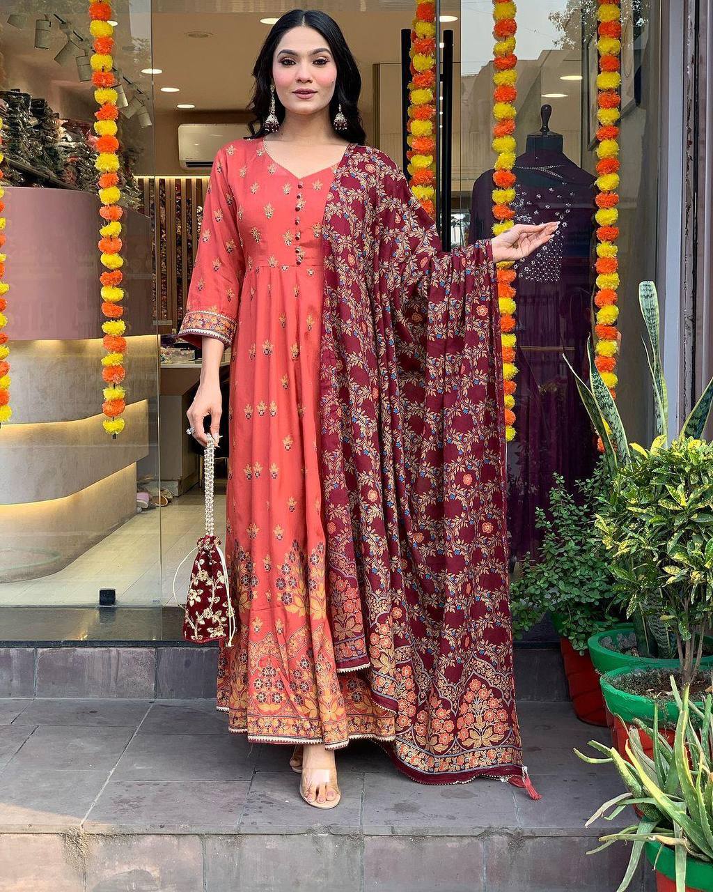 "Elegant Rust Anarkali Set with Maroon Dupatta & Potli Bag – Festive & Ethnic Wear"