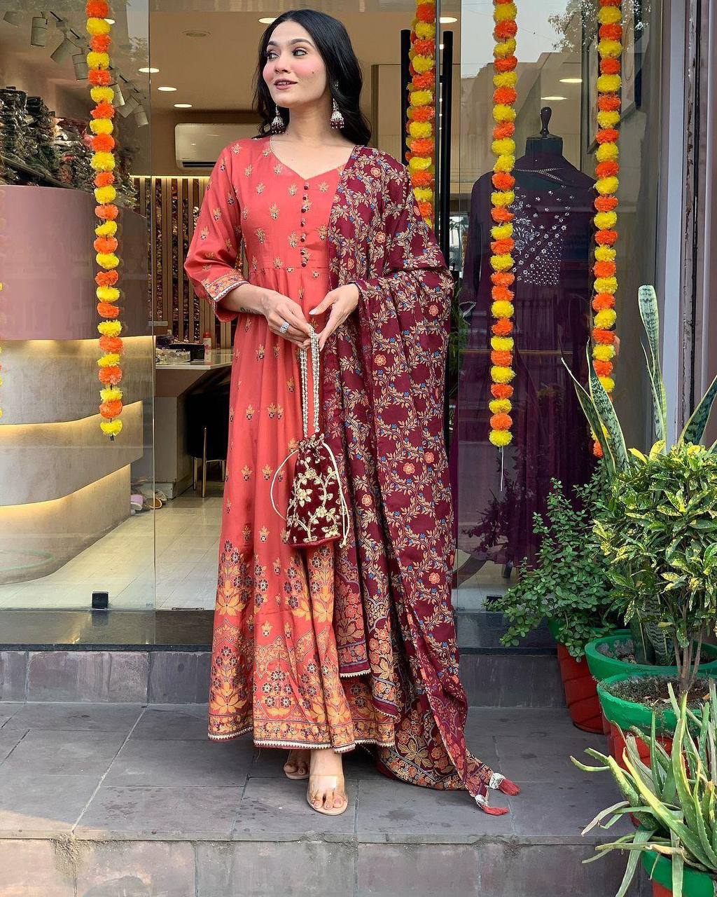 "Elegant Rust Anarkali Set with Maroon Dupatta & Potli Bag – Festive & Ethnic Wear"