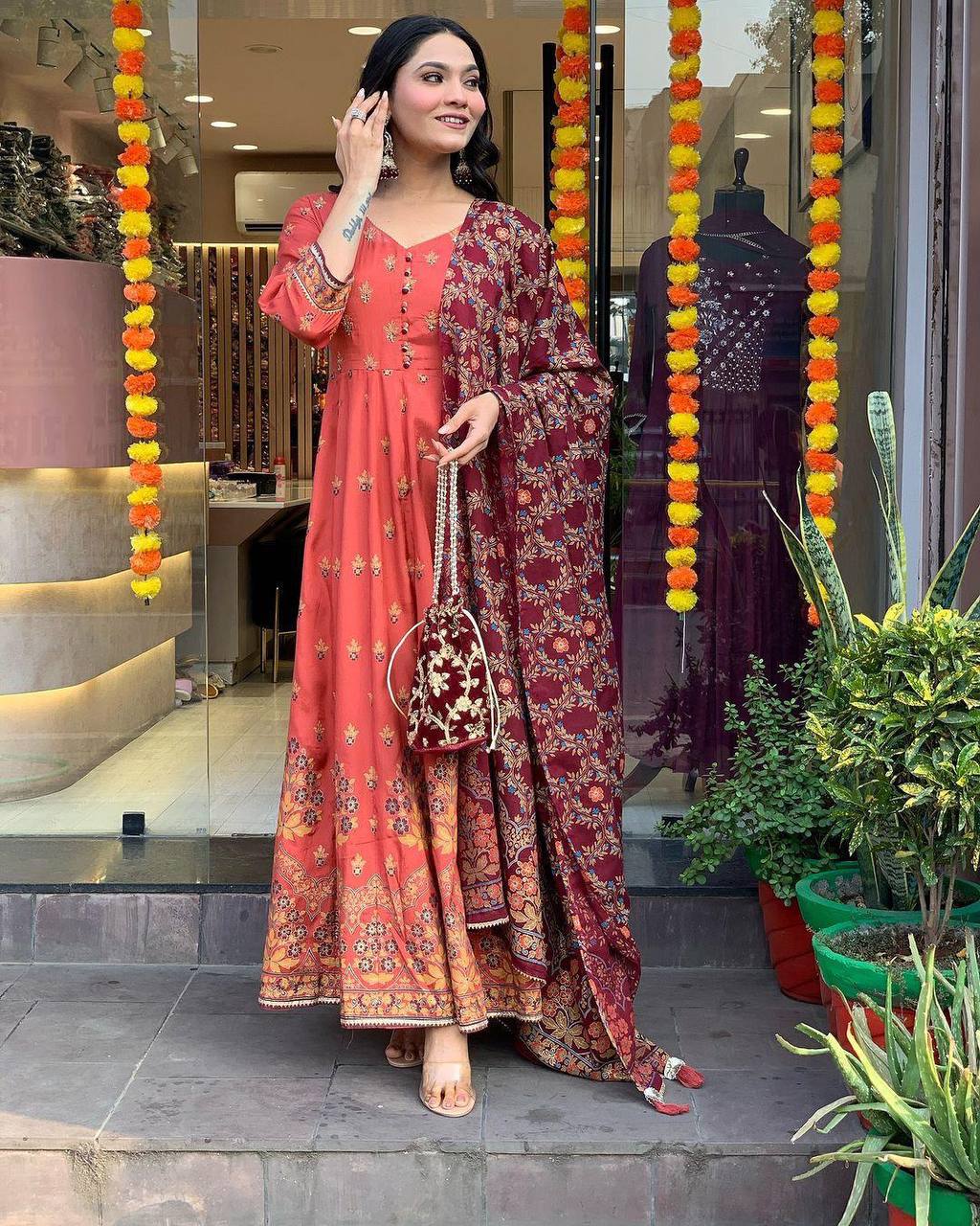 "Elegant Rust Anarkali Set with Maroon Dupatta & Potli Bag – Festive & Ethnic Wear"