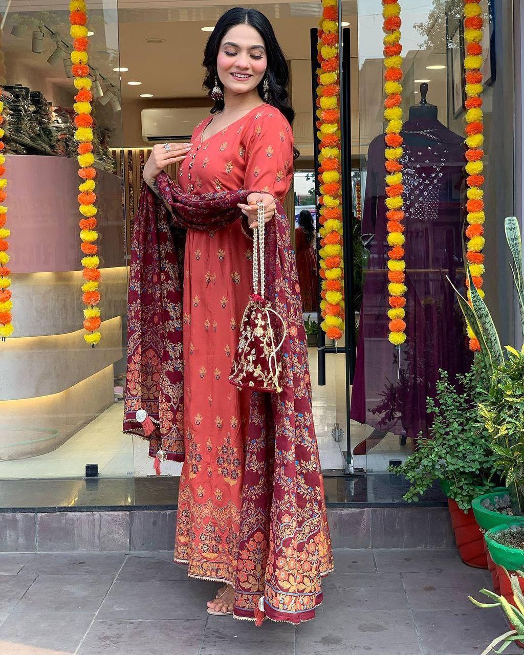 "Elegant Rust Anarkali Set with Maroon Dupatta & Potli Bag – Festive & Ethnic Wear"
