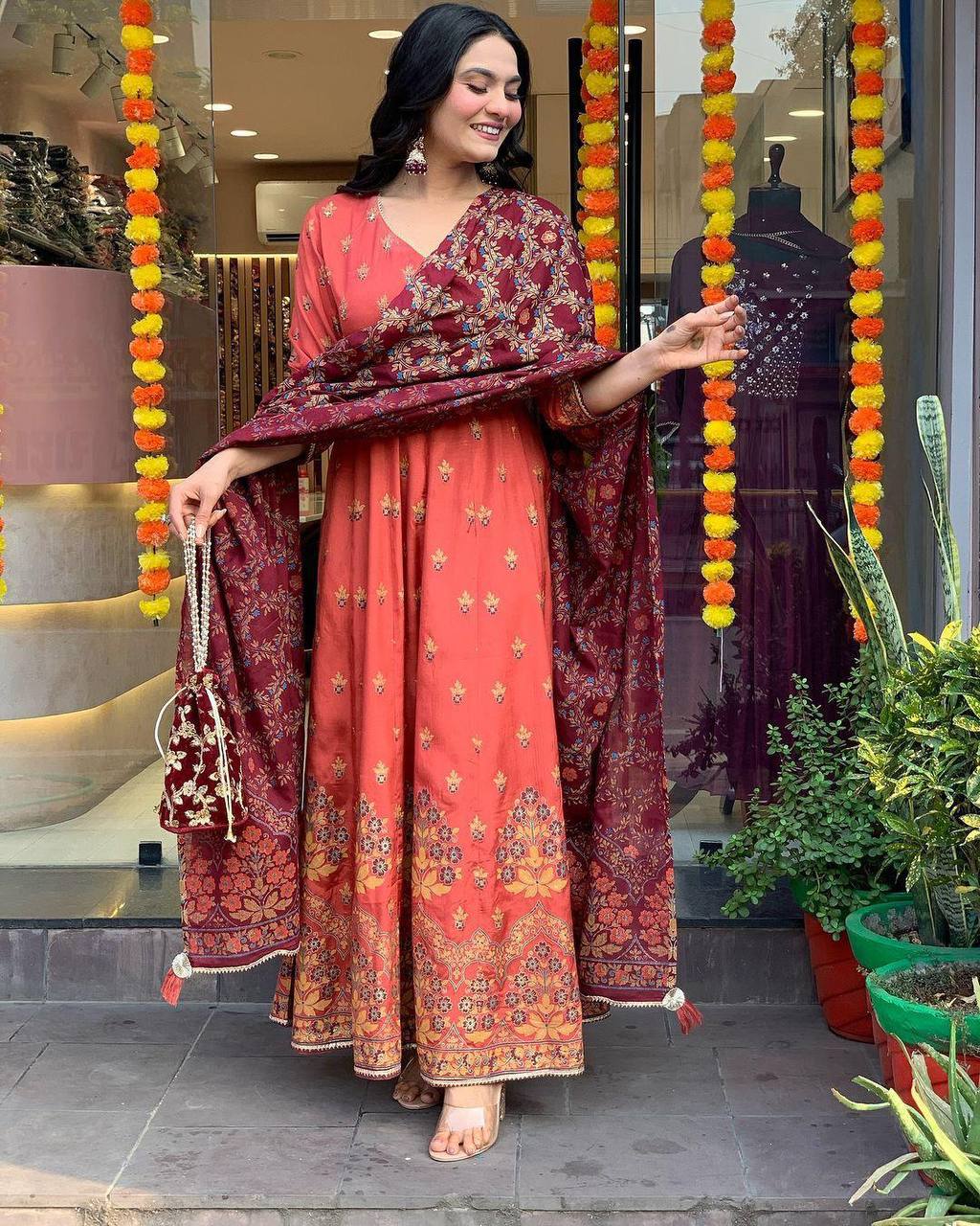 "Elegant Rust Anarkali Set with Maroon Dupatta & Potli Bag – Festive & Ethnic Wear"