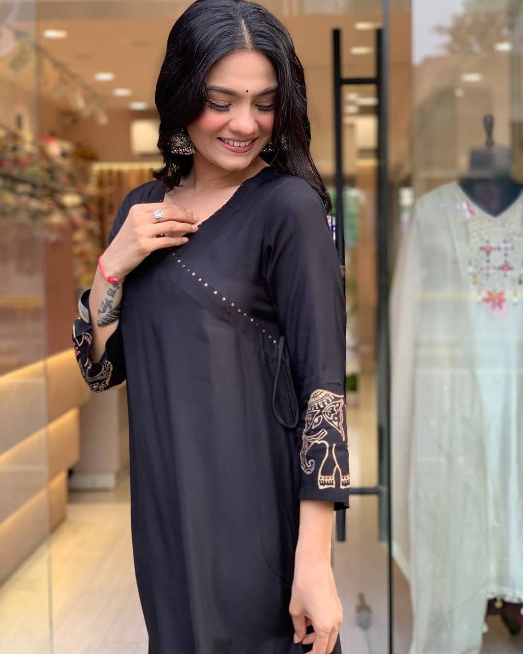 "Black Kurta Set with Embroidered Elephant Motifs – Chic Ethnic Statement"
