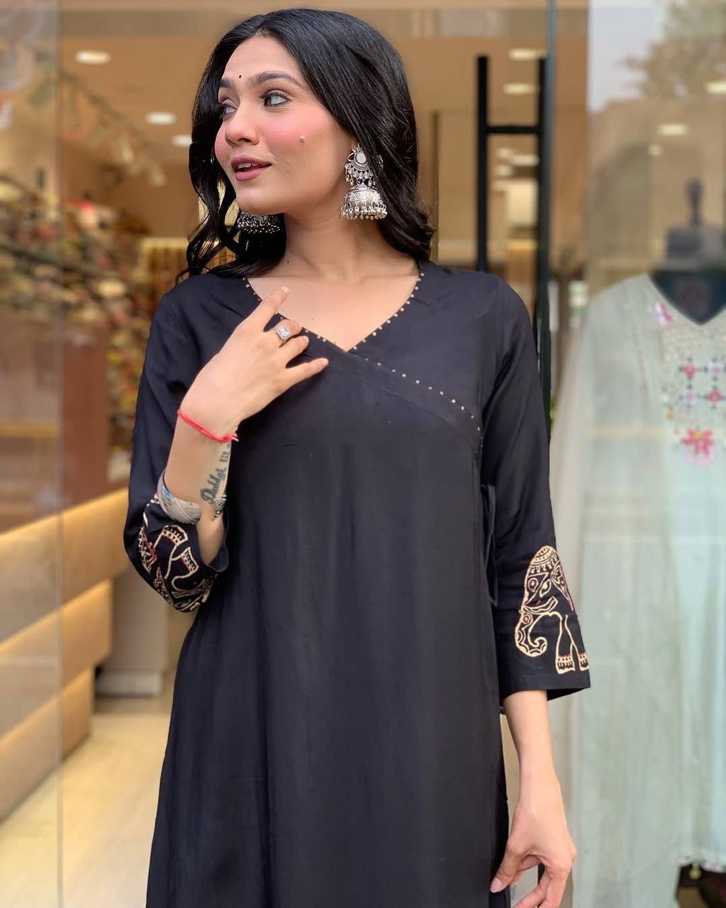 "Black Kurta Set with Embroidered Elephant Motifs – Chic Ethnic Statement"