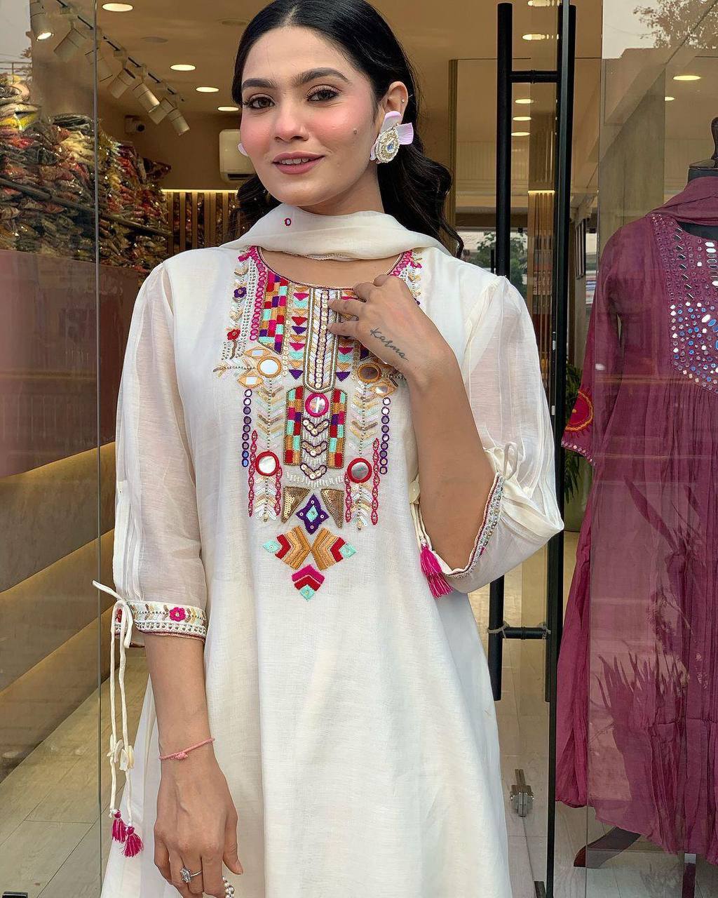 Traditional White Chikankari Suit with Colorful Detailing