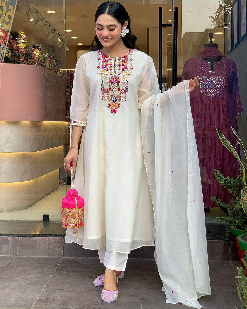 Traditional White Chikankari Suit with Colorful Detailing